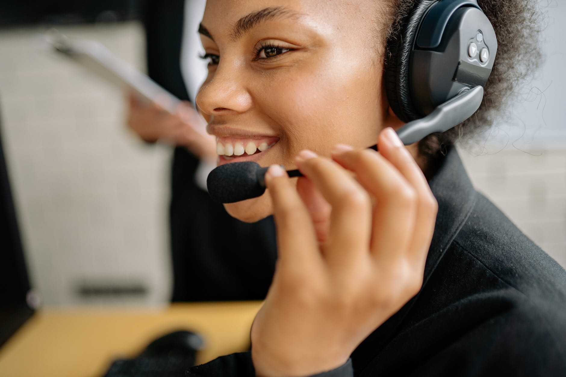 a smiling call center agent