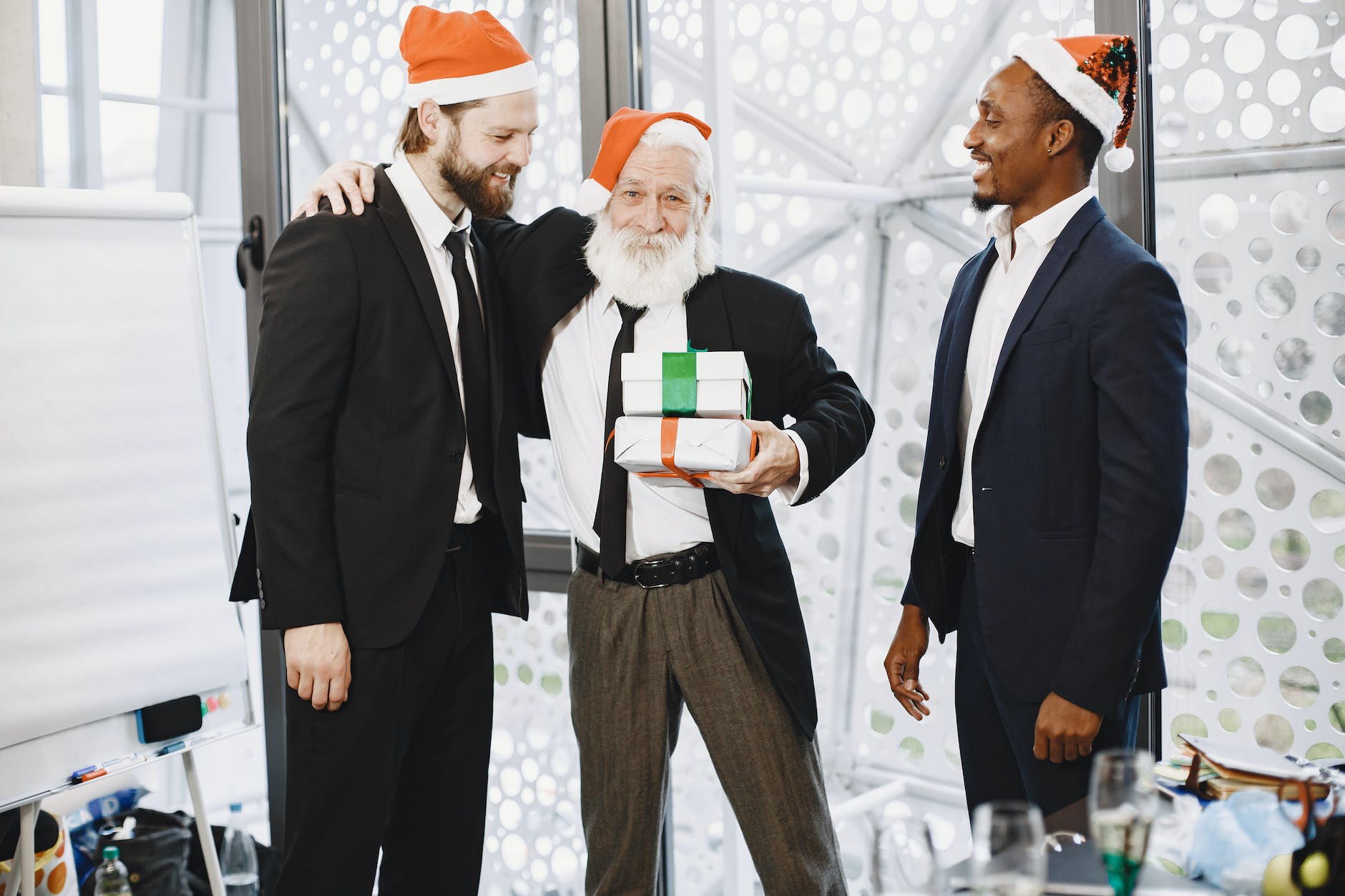 men in office doing secret santa