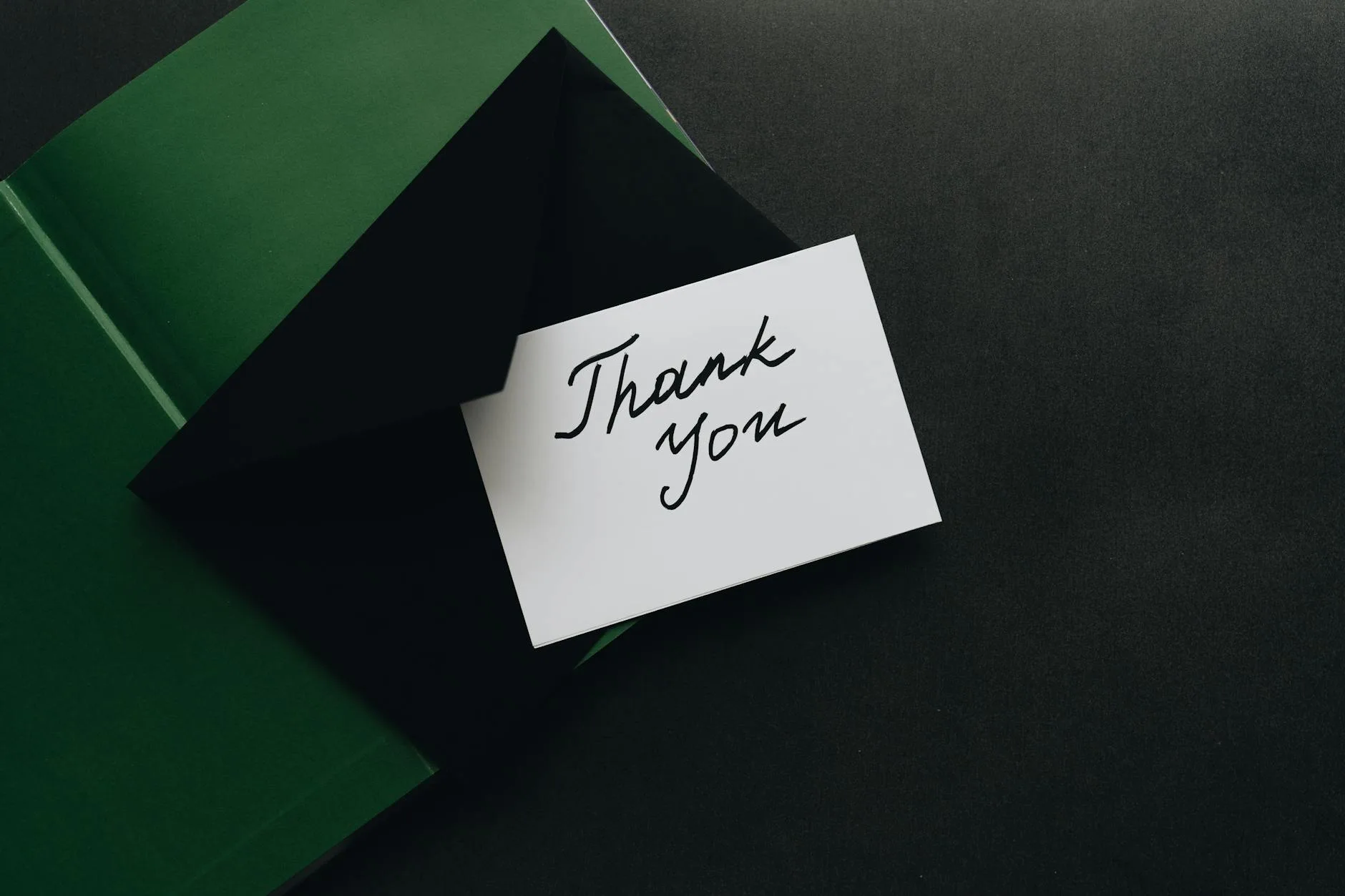 thank you card on top of an envelope